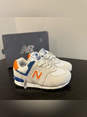 New Balance Kids Light Gray Sneakers with Orange & Blue Accents